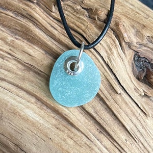 Sea glass jewelry- Aqua blue sea glass set with a sterling silver grommet