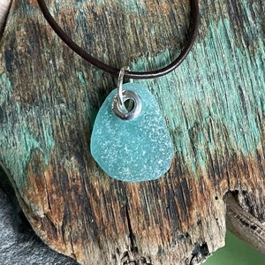 Sea glass jewelry- Aqua blue sea glass set with a sterling silver grommet