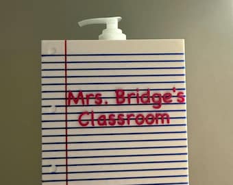 Hand sanitizer holder with interchangeable plates