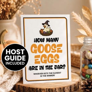Op de afbeelding: Een witte rechthoekige spelkaart met een zwarte rand met een cartoon gans met een heksenhoed die in een nest met gekleurde eieren zit. De tekst luidt: HOW MANY GOOSE EGGS ARE IN THE JAR? WHOEVER GETS THE CLOSEST IS THE WINNER! Een zwarte cirkel vermeldt HOST GUIDE INCLUDED.