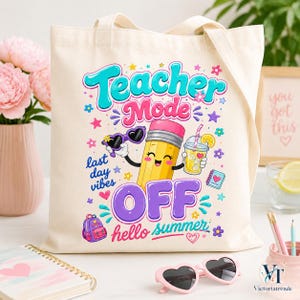 Tote bag mockup featuring the Teacher Mode Off hello summer design in a feminine pastel workspace with flowers and stationery.