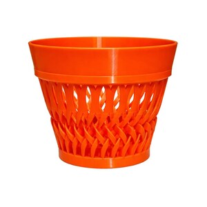 May include: Bright orange woven basket-style planter. The planter has a wide, smooth rim and a woven pattern on the lower portion. The planter is made of a hard plastic material and is suitable for indoor or outdoor use.