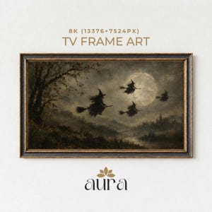May include: A rectangular TV frame art piece featuring a dark, moody landscape painting of three silhouettes of witches flying on broomsticks against a large full moon. The artwork is enclosed in a dark, weathered frame with gold trim.