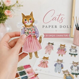 K&ouml;nnte beinhalten: Ein Papierpuppen-Set mit Illustrationen von Katzen in verschiedenen Outfits. Der Hauptausschnitt zeigt eine orangefarbene getigerte Katze mit einem Blumenoberteil und einem rosa Rock. Der Text lautet Cats PAPER DOLL und 30 UNIQUE CHARACTERS.
