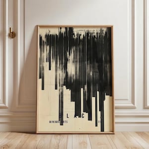 May include: Framed abstract art print with a wooden frame. The artwork displays vertical black brushstrokes on a cream backdrop. The word "BLAC" is visible in blue text, along with "MINIMAL ARTS" and the number "11".