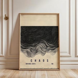 May include: Framed art print with the word "CHAOS" in bold black letters. The artwork features a black and white abstract design resembling flowing lines. The words "MINIMAL ARTS" and the number "193" are also visible.