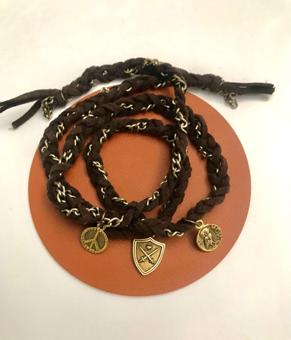 Unisex hand braided suede  wrap. Made with soft brown suede  and finish with golden tone chain and 3 charms. Very special gift