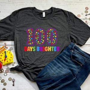 Digital design for crafting svg file for cricut silhouette clip art sublimation. 100 days of school design with a large purple outline 100 with rainbow stars speckled inside. Underneath it says days brighter in all rainbow capital letters.
