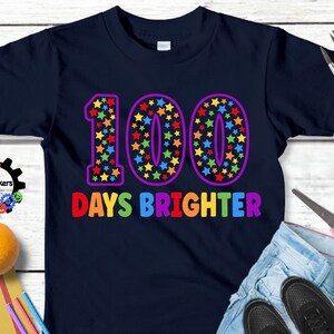 Digital design for crafting svg file for cricut silhouette clip art sublimation. 100 days of school design with a large purple outline 100 with rainbow stars speckled inside. Underneath it says days brighter in all rainbow capital letters.