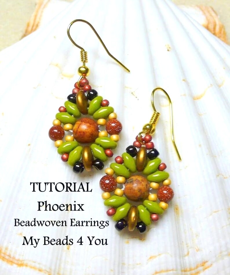 May include: A pair of beadwoven earrings featuring a central brown speckled stone bead surrounded by lime green petal-shaped beads, small gold-toned beads, and dark brown glittery accents. The earrings hang from gold-toned hooks. Text reads: TUTORIAL Phoenix Beadwoven Earrings My Beads 4 You.
