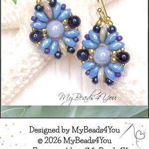 May include: A pair of dangle earrings featuring a central light blue bead surrounded by a floral pattern of elongated blue petals, dark navy round beads, and small gold accents, suspended from gold-toned metal ear wires on a white textured surface.