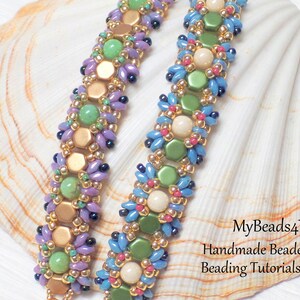 May include: Two beaded bracelets with a variety of colorful beads. The bracelets feature gold, green, purple, blue, and cream-colored beads. The bracelets are displayed on a white seashell.