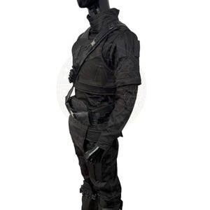 May include: A black tactical uniform featuring a high-neck long-sleeve shirt, a structured chest vest with a diagonal strap, and matching trousers. The ensemble includes multiple utility pockets, reinforced stitching, and metallic buckles.