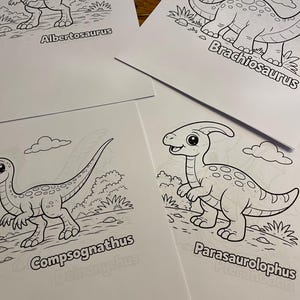 May include: Four white paper sheets featuring black line drawings of dinosaurs. The dinosaurs are labelled: Albertosaurus, Brachiosaurus, Compsognathus, and Parasaurolophus. Each dinosaur is depicted in a different pose, with a backdrop of plants and clouds.