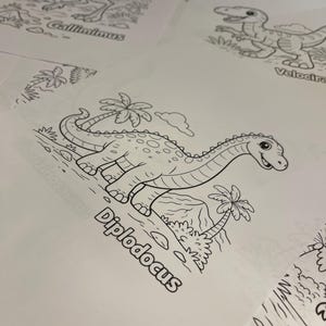 May include: A collection of dinosaur-themed colouring pages. The pages feature line drawings of dinosaurs such as Diplodocus, Gallimimus, and Velociraptor. Each page includes the dinosaur's name in a bold font, alongside illustrations of palm trees and other scenery.