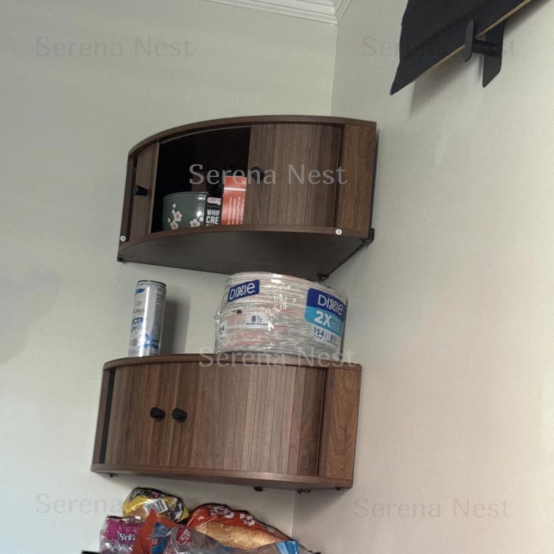 Corner Shelves Floating Wall Cabinet Set of 3, Fluted Corner Shelf with Sliding Doors and Walnut Finish | Floating Corner Shelf for Living Room Bedroom and Office | Space Saving Wall Storage

Empty corners are some of the most overlooked storage opportunities in any home. These corner shelves by Serena Nest turn every unused wall angle into a stylish, functional display space that works just as hard as it looks good.