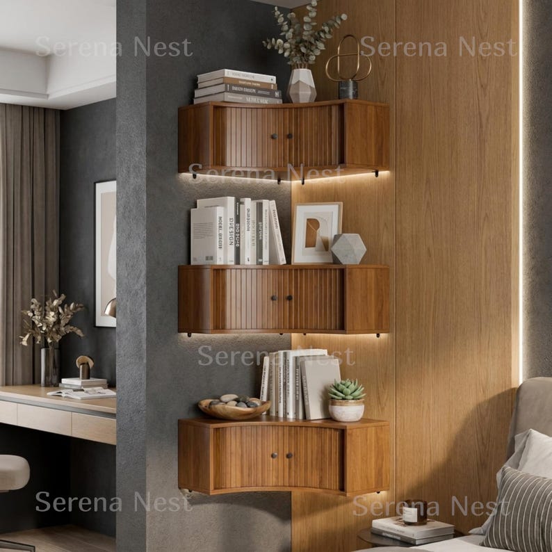 Corner Shelves Floating Wall Cabinet Set of 3, Fluted Corner Shelf with Sliding Doors and Walnut Finish | Floating Corner Shelf for Living Room Bedroom and Office | Space Saving Wall Storage

Empty corners are some of the most overlooked storage opportunities in any home. These corner shelves by Serena Nest turn every unused wall angle into a stylish, functional display space that works just as hard as it looks good.