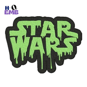 May include: An embroidered patch with the words "STAR WARS" in a dripping, green font on a black background. The patch has a black border and the text is in a bright green colour. The patch also has the text "HO EMB" in the upper left corner.