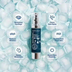 Peut inclure: Un flacon argent&eacute; et bleu marine de cr&egrave;me pour le visage Particle Men's Formula, entour&eacute; de gla&ccedil;ons. Le produit promet de diminuer les poches sous les yeux, de r&eacute;duire les rides, d'&eacute;claircir les taches sombres, d'apaiser la peau apr&egrave;s le rasage et d'hydrater.
