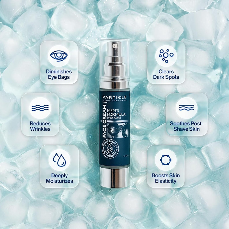 Peut inclure: Un flacon argent&eacute; et bleu marine de cr&egrave;me pour le visage Particle Men's Formula, entour&eacute; de gla&ccedil;ons. Le produit promet de diminuer les poches sous les yeux, de r&eacute;duire les rides, d'&eacute;claircir les taches sombres, d'apaiser la peau apr&egrave;s le rasage et d'hydrater.