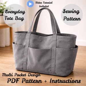 May include: A grey tote bag with multiple pockets, ideal for everyday use. The bag has strong handles and is made of durable fabric. The image includes text that says "Everyday Tote Bag", "Sewing Pattern", "Multi Pocket Design", and "PDF Pattern + Instructions".