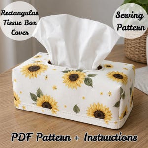 May include: A rectangular tissue box cover featuring a sunflower print on a white background with a white tissue protruding from the top. The text Rectangular Tissue Box Cover, Sewing Pattern, and PDF Pattern + Instructions are visible.