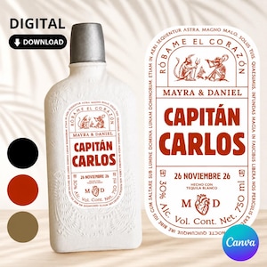 Puede incluir: Una botella blanca con tapón plateado que presenta una etiqueta con el texto Róbame el Corazón, Capitán Carlos, Mayra & Daniel, 26 Noviembre 26, 30% Alc. Vol. Cont. Net. 750 ml, Hecho con Tequila Blanco y una ilustración de un corazón y dos figuras.