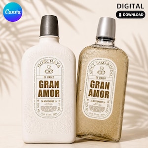 Pode incluir: Duas garrafas de vidro de 750 ml rotuladas como Gran Amor. A garrafa da esquerda é branca opaca com tampa escura e rótulo Horchata. A garrafa da direita é transparente com tampa prateada e rótulo Spicy Tamarindo, ambas com um logótipo de dois anéis.