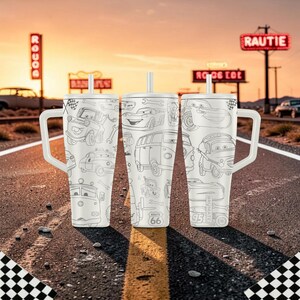 May include: A white stainless steel tumbler with a handle and straw, featuring a black line art pattern of various animated car characters, wrenches, and a Route 66 sign. The design includes multiple vehicle illustrations and the text BRUMATE.