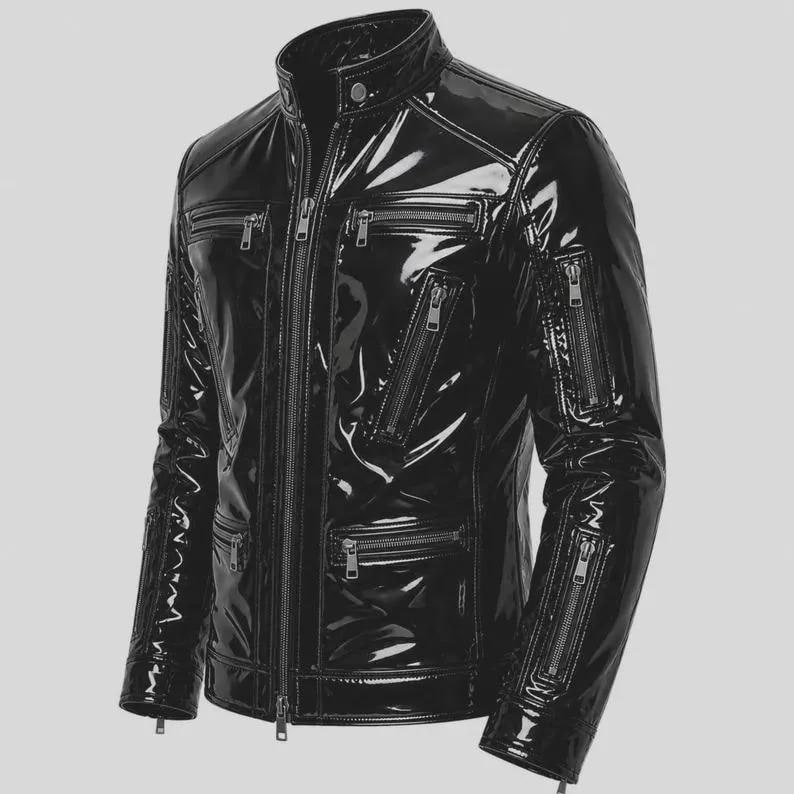 May include: A black glossy jacket with a high collar and a full-length front zipper. The jacket features multiple zippered pockets on the chest and sleeves, with silver-toned metal hardware throughout. The material has a reflective, patent finish.
