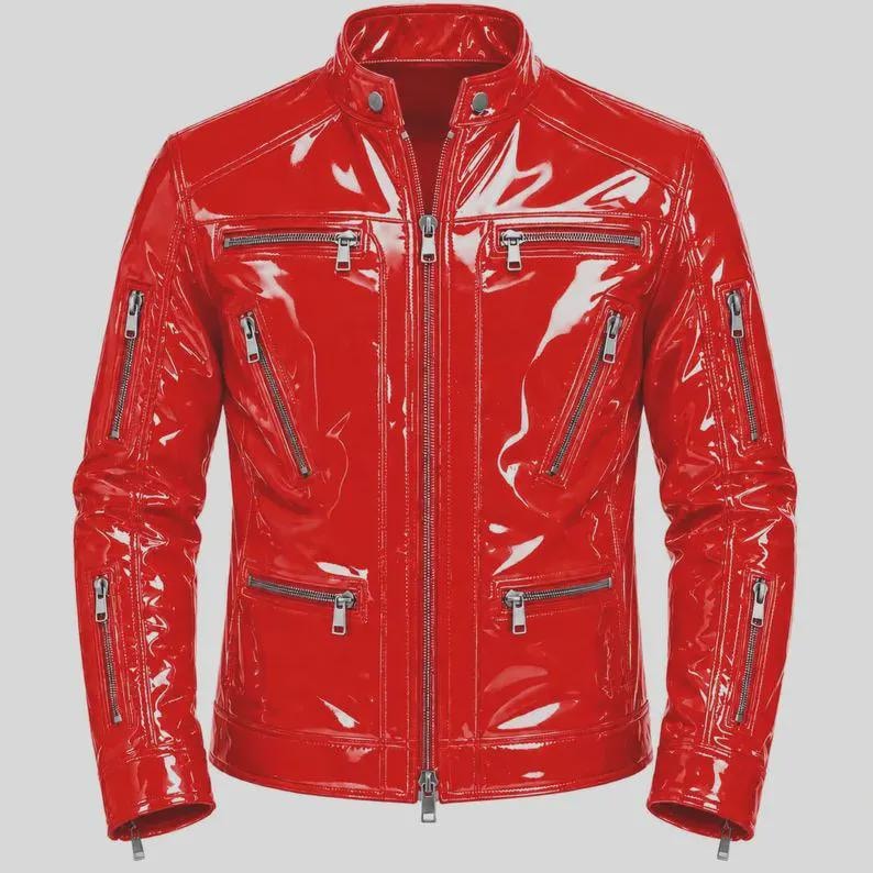 May include: A bright red jacket with a glossy, patent-like finish. The jacket features a stand-up collar with a snap button, a central full-length zipper, and multiple silver-toned zippered pockets on the chest, waist, and sleeves.