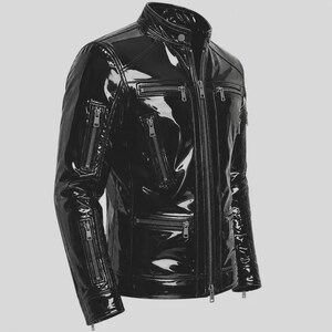 May include: A black jacket with a high-gloss, reflective finish. The garment features a stand-up collar, a full-length front zipper, and multiple zippered pockets on the chest and sleeves. The design includes long sleeves with zippered cuffs.