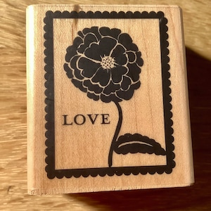 Fleur d'amour faux timbre en caoutchouc d'occasion