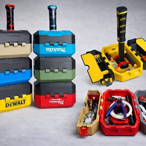 May include: A collection of colorful toolboxes, each with a hammer-shaped handle. The toolboxes are stacked and open, revealing various tools. The brands DeWalt, Makita, and Milwaukee are visible on the boxes. The open toolboxes display tools like pliers, screwdrivers, and measuring tapes.