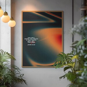 May include: Framed art print with a gradient design in teal, orange, and black. The print features the text "YOU WILL KNOW THE TRUTH & THE TRUTH WILL SET YOU FREE" and "JOHN 8:32" in white. The artwork is displayed on a gray wall.