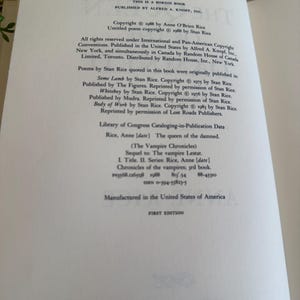 May include: Open book page with text. The text includes copyright information, publishing details, and a list of poems by Stan Rice. The book is titled "The Vampire Chronicles" and is a first edition.