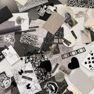 Könnte beinhalten: Eine Sammlung von Scrapbooking-Materialien, darunter schwarz-weiße Aufkleber, Filmstreifen, Spielkarten mit der Acht Pik, strukturierte Papierstücke, schwarze Umschläge, Herz-Ausschnitte und verschiedene gedruckte Bilder in Schwarz-, Weiß- und Grautönen.