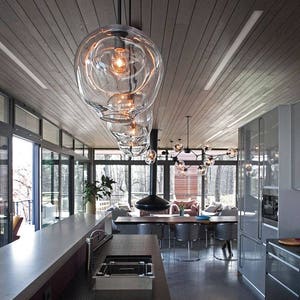 Blown glass pendant light - 1 big dent per side with small openings, blown glass lighting, hanging pendant lights, interior design lighting