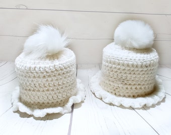 crocheted toilet roll hat in beige white with pompom