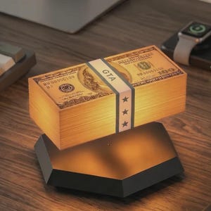 Lámpara de mesa con forma de pila de dinero flotante de GTA: lámpara de escritorio con levitación magnética para gamers.