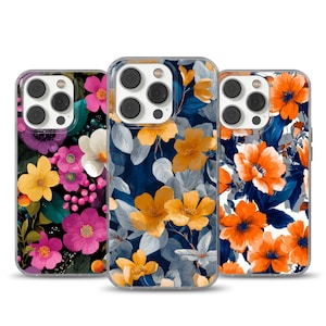 May include: Three phone cases with floral patterns. The cases display bright flowers in shades of pink, yellow, orange, and white against dark and light backgrounds. The cases have a clear border.