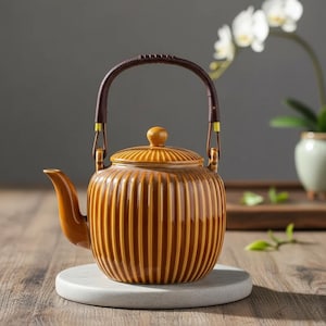 Tetera con asa de ratán / Hervidor de cerámica ámbar acanalado / Tetera de estilo japonés con tapa