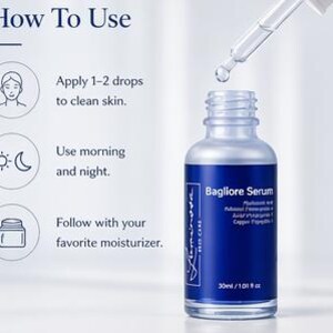 May include: A blue and silver Bagliore Serum bottle with a dropper dispensing a drop of serum. The bottle has a white label with the text "Bagliore Serum" and "30ml / 1.01 fl oz". Instructions on how to use the serum are also included.