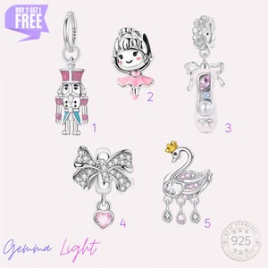May include: Five sterling silver charms labeled 1 through 5. Charm 1 is a nutcracker, 2 is a ballerina, 3 is a ballet slipper, 4 is a bow with a heart pendant, and 5 is a swan with a crown. Each charm features pink, blue, or clear accents.