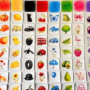May include: A grid of square cards featuring watercolor illustrations of various objects including animals, fruits, vegetables, vehicles, and nature elements. Each card displays a single subject like a mushroom, pumpkin, lemon, cat, cherry, butterfly, or frog.
