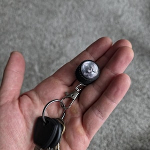 Brelok do gałki gitarowej – niestandardowy obraz, akcesorium do pokrętła głośności