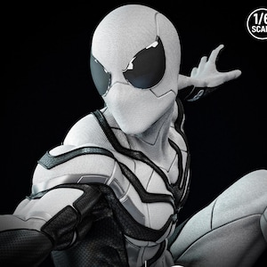 May include: A detailed, close-up of a white and black Spider-Man action figure. The figure is in a dynamic pose, with a textured white suit and black accents. The figure is 1/6 scale.