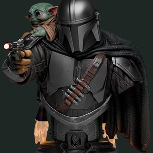 May include: A detailed bust of the Mandalorian from the Star Wars series, in dark gray armor, holding a blaster. Grogu, also known as Baby Yoda, sits on his shoulder. The bust has a black cape and a brown belt with ammunition.