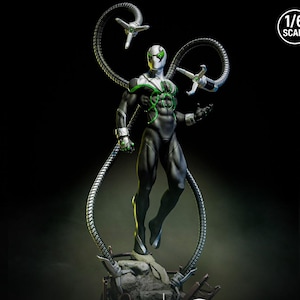 May include: A detailed action figure of a superhero in a black and white suit with green accents. The figure has four metallic tentacles and is posed dynamically. The figure is 1/6 scale.