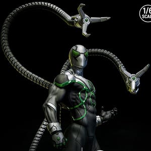 May include: A detailed action figure of a superhero in a black and silver suit with green accents. The figure has mechanical arms extending from its back. The text "1/6 SCALE" is in the upper right corner.